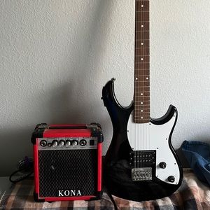 electric guitar with amp (doesn’t come with connector for amp and guitar)
